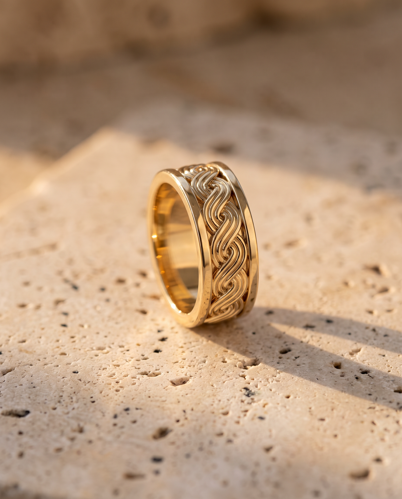Pleter interlace ring on Dalmatian travertine