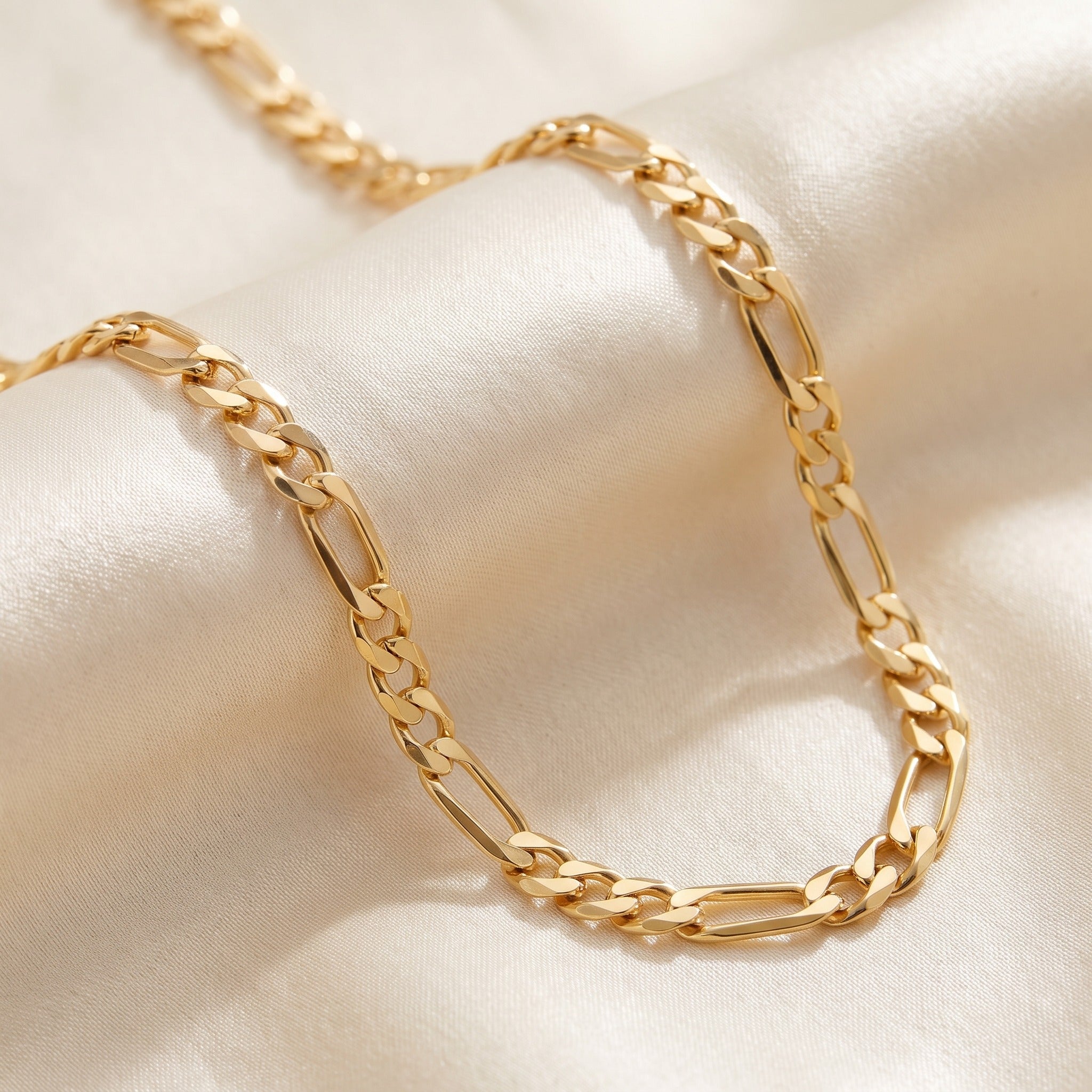 Diamond Cut Figaro Chain 3.95mm - Yellow Gold - luxury lifestyle image