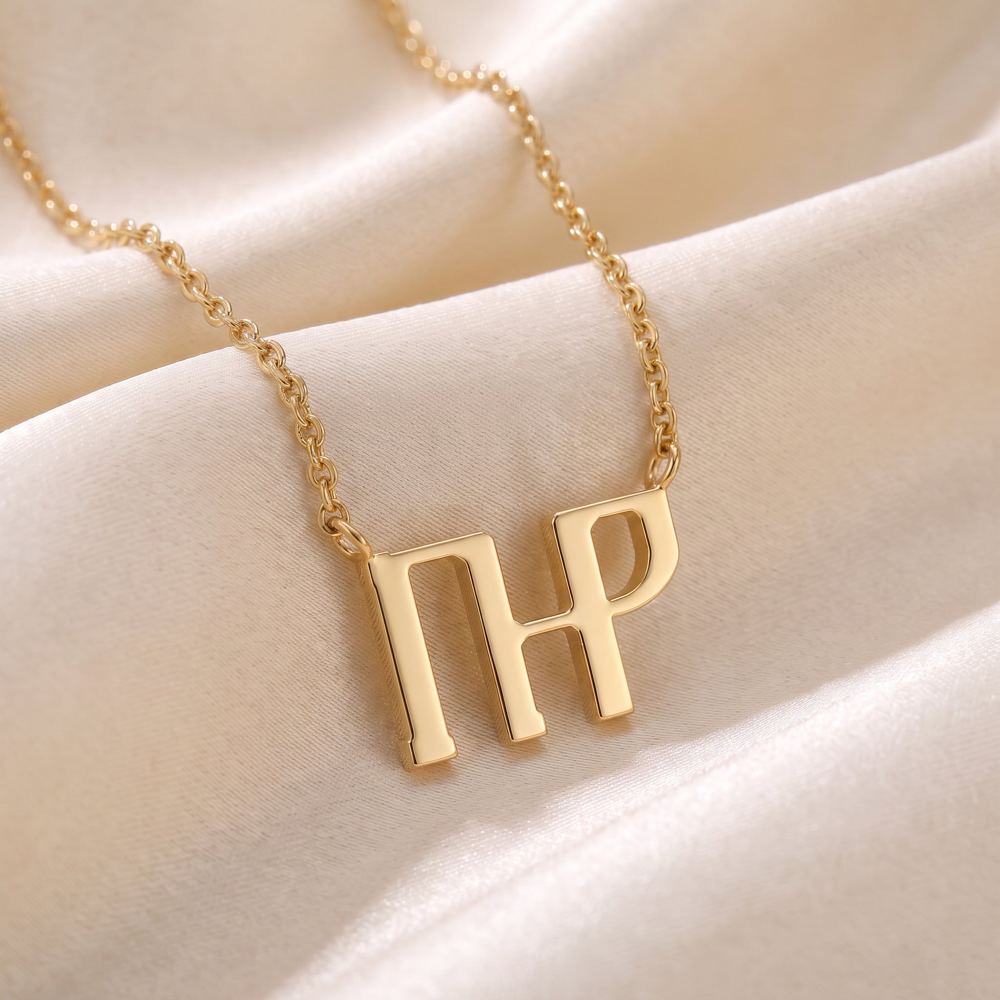Glagolitic letter Đ (Đerv) pendant necklace in 9ct yellow gold on silk