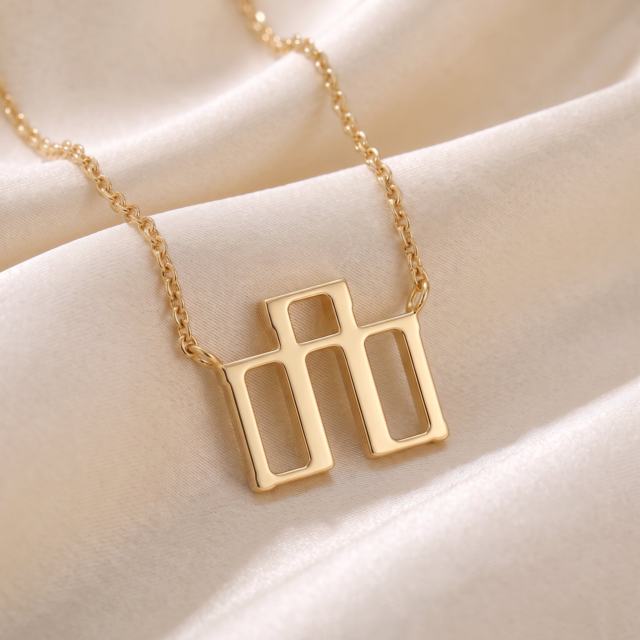 Glagolitic letter L (Ljudi) pendant necklace in 9ct yellow gold on silk