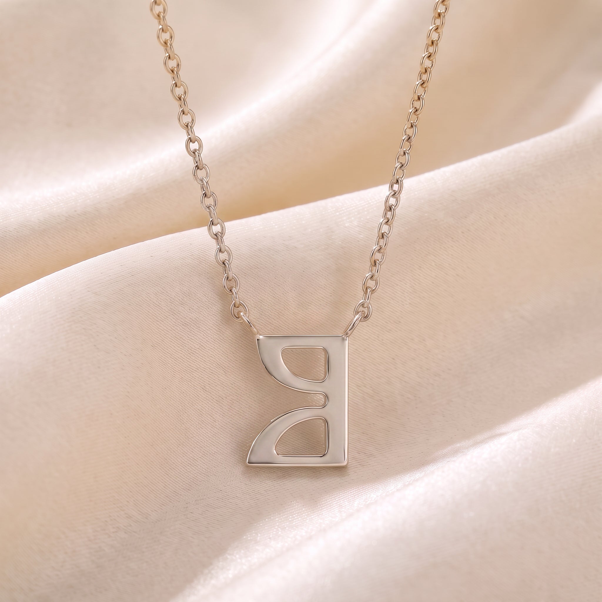 Glagolitic letter O (On) pendant necklace in 9ct white gold on silk