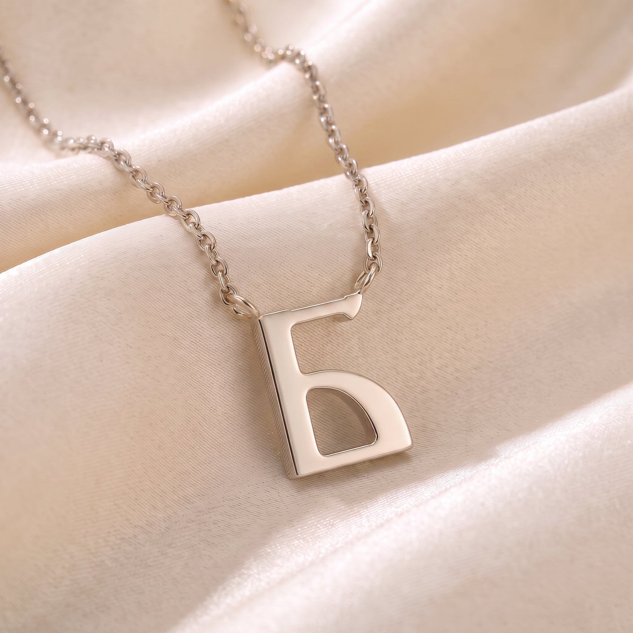 Glagolitic letter R (Rci) pendant necklace in 9ct white gold on silk