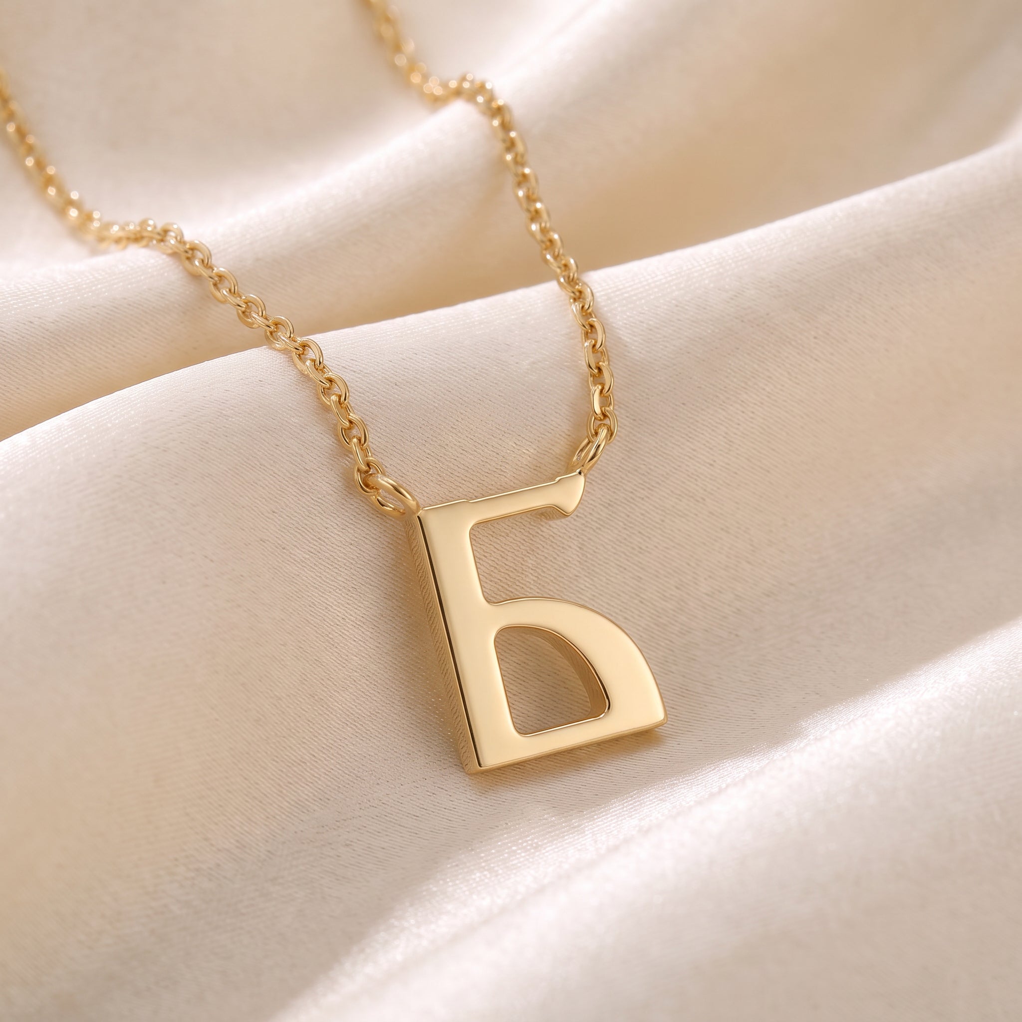 Glagolitic letter R (Rci) pendant necklace in 9ct yellow gold on silk