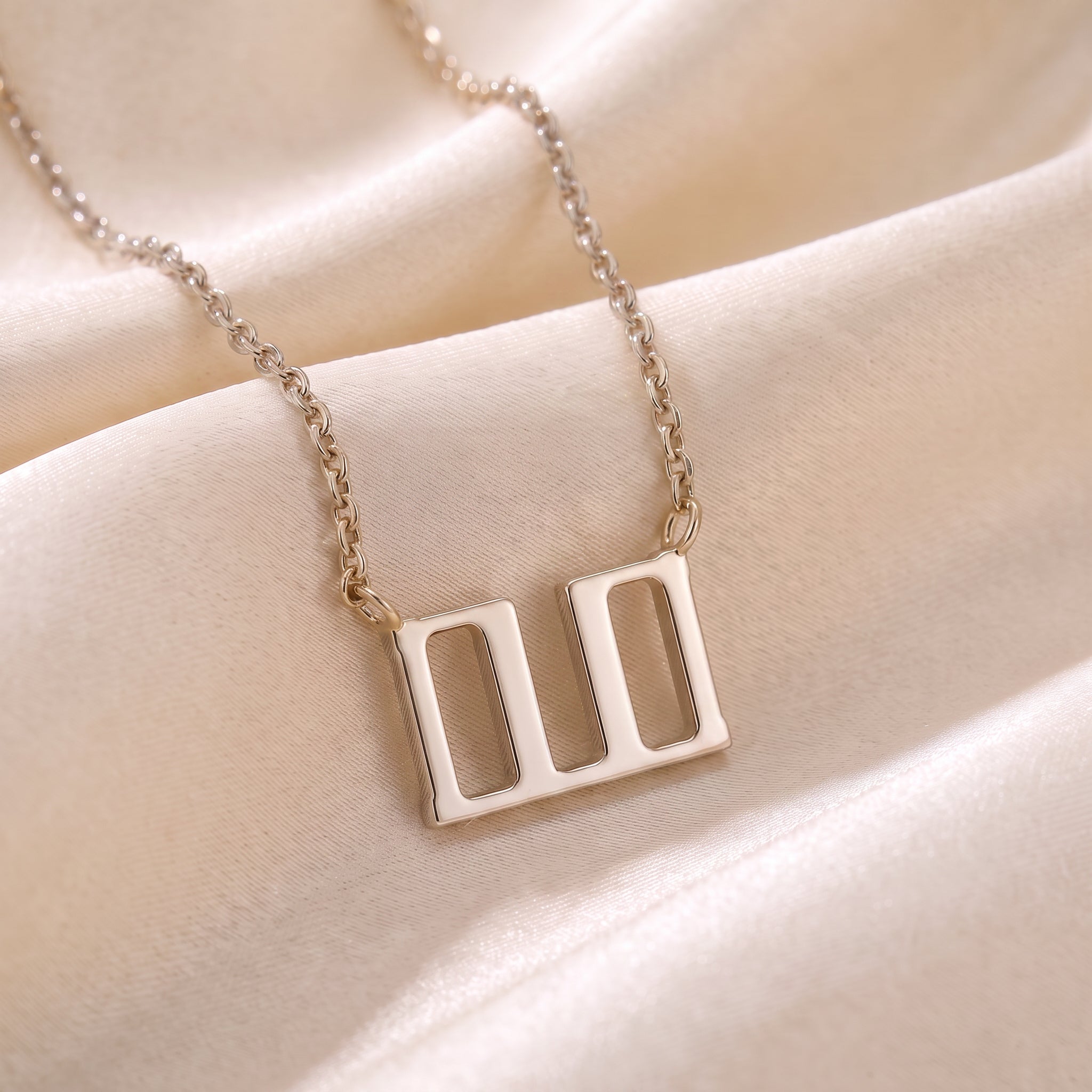 Glagolitic letter V (Vědě) pendant necklace in 9ct white gold on silk