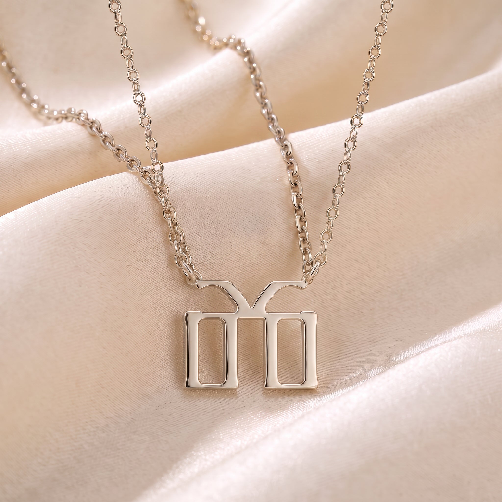 Glagolitic letter Ž (Živěte) pendant necklace in 9ct white gold on silk