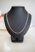 Solid 9ct yellow gold 3.3mm handmade Cuban link chain shown full length on a bust