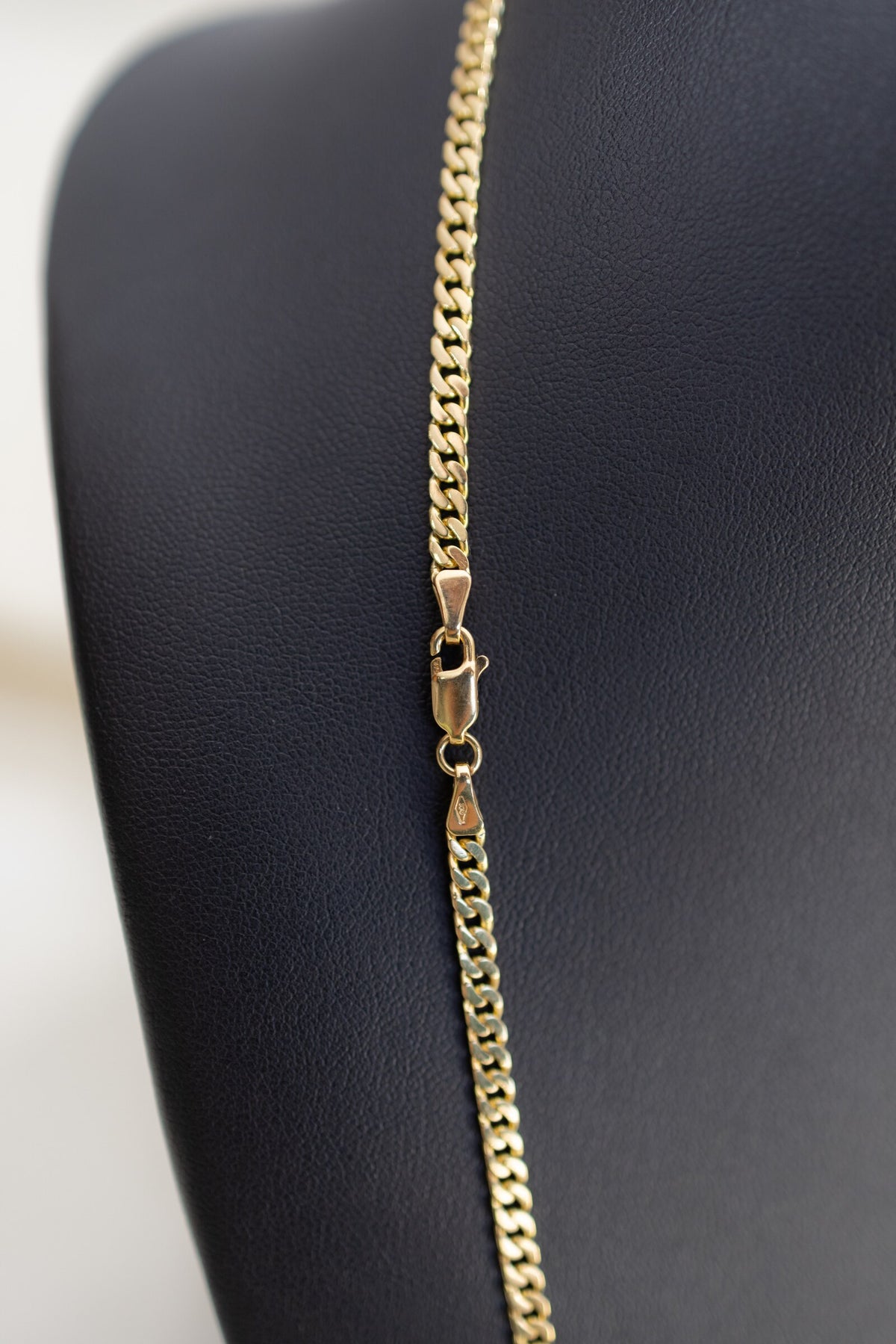 Lobster clasp and hallmarked tag on the handmade 3.3mm 9ct yellow gold Cuban link chain