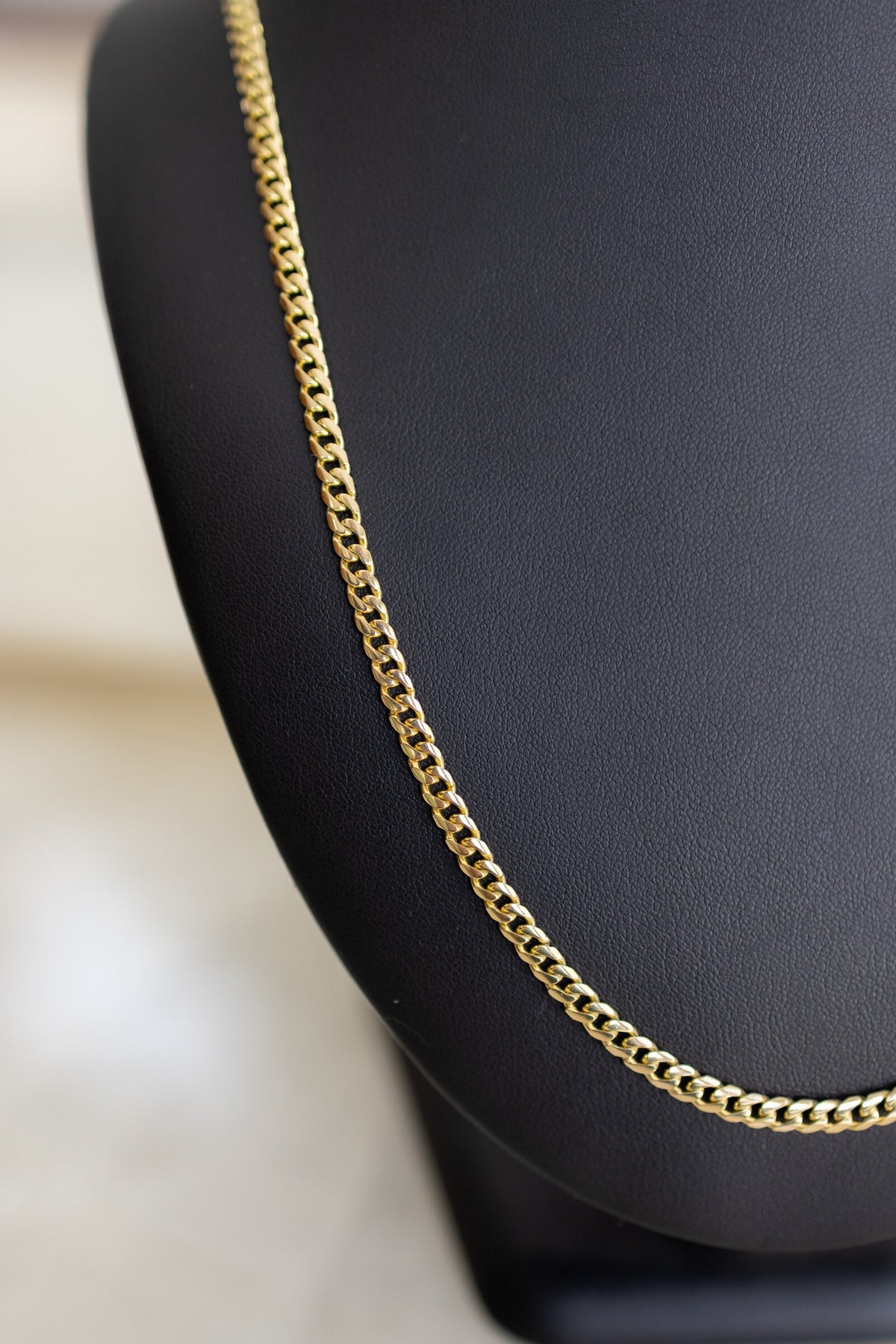 Side view of the 4mm handmade Cuban link chain in solid 9ct yellow gold